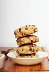 Stacked gluten free cookies in a white bowl