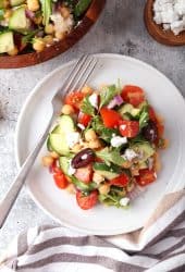 Finished Greek salad on a white plate