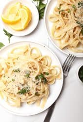 Plate of fettuccine Alfredo with vegan parmesan