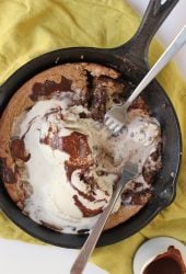 Finished dessert in a skillet with two forks