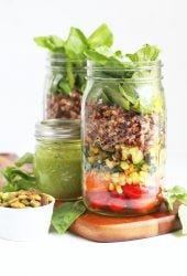 Finished salads in two large Mason jars