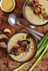 Two bowls of Cream of Cauliflower Soup