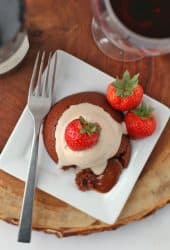 Piece of Chocolate Lava Cake on a white plate with a fork