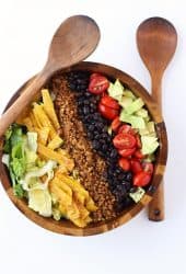 Finished salad in a wooden salad bowl