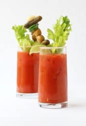 Two Bloody Mary's on a white background