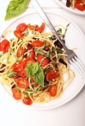 One plate of vegan pasta with cherry tomatoes