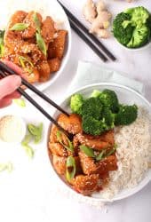 Finished recipe on a white plate with chopsticks